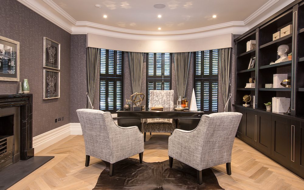 the office at king's view, an aspire development, with artwork lining the walls.